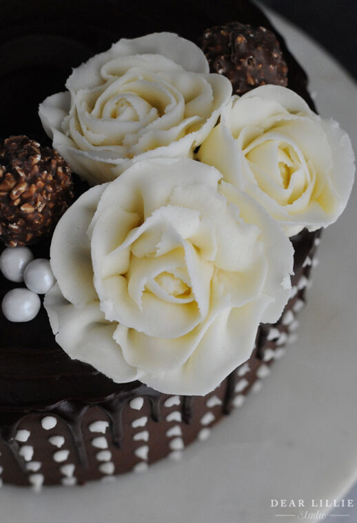 Chocolate Drip Cake with Polka Dots and White Roses - Dear Lillie Studio