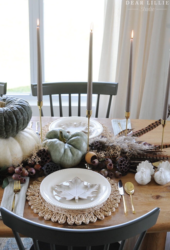 Thanksgiving Table Setting with Turkey Feathers and Natural Elements ...