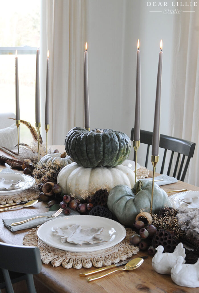 Thanksgiving Table Setting with Turkey Feathers and Natural Elements ...